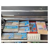 Assorted hardware kits. Open boxes