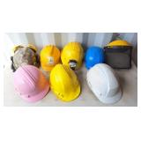 7 hard hats and 1 safety shield