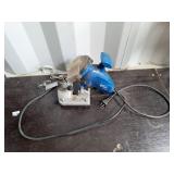 Power fist electric chain saw sharpener