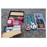 3 wii guitars and 2 Playstation 2 guitars