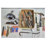 Assortment of tools wedges hammers, files,