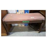 Lovely piano bench with padded pink top