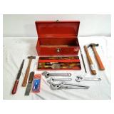 Metal toolbox with chisels, crescent wrenches,