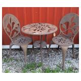 Lovely metal conversation table and 2 chairs.