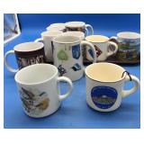 A Dozen Collectable Souvenir Mugs