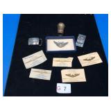 Sterling silver and gold military items