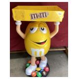 Yellow M&M Candy Display on Wheels