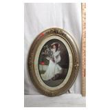 Oval Framed Print of Lady in Dress holding Flowers