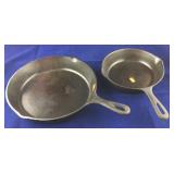 One Large and One Medium Cast Iron Skillet