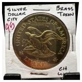 VINTAGE SILVER DOLLAR CITY BRASS TOKEN