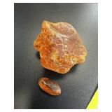 124 CTS AMBER (ANT OR BUG IN SMALLER STONE)