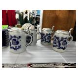4PC MATCHED POTTERY BEER STEINS NOTE
