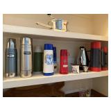 CONTENTS OF SHELF LARGE LOT OF THERMOSES