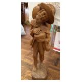 LARGE CARVED WOOD SCULPTURE MAN W PACK