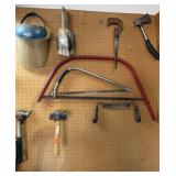 TOOLS HANGING ON THIS SECTION PEG BOARD DRAW PLANE