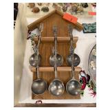 6 PIECE LARGE PEWTER SOUP SPOONS  W STAND