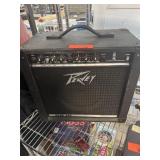 PEAVEY RAGE 158 AMPLIFIER POWERS ON