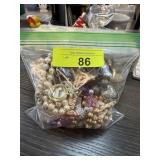 BAG OF MIXED JEWELRY W JEWELRY BOOKS