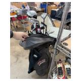 LOT OF GOLF CLUBS IN A COORS LIGHT BAG