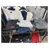 LOT OF ADIDAS ITEMS CONTENTS ON SHELF LOT OF ADIDAS ITEMS CONTENTS ON SHELF