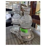 GEORGIAN 3 BOTTLE TANTALUS ON SILVER PLATED STAND