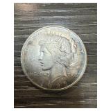 1928-D PEACE SILVER DOLLAR TONED