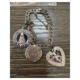 STERLING SILVER CHARM BRACELET W SOME CHARMS