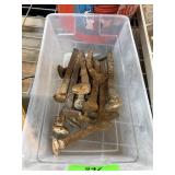 LARGE BIN OF IRON RAILROAD TIES