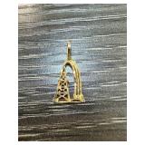 14K GOLD OIL DERRECK GUSHER PENDANT