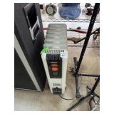 RADIATOR STYLE HEATER POWERS ON
