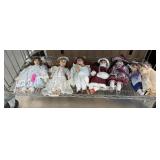 CONTENTS OF SHELF LOT OF PORCELAIN DOLLS