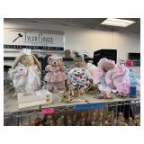 CONTENTS OF SHELF LARGE LOT OF DOLLS FIGURINES