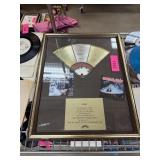 PORTION OF GOLD RECORD FROM PARLIAMENT FUNKADELIC
