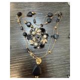 BLACK & GOLD FLORAL BROOCH & NECKLACE BLACK & GOLD FLORAL BROOCH & NECKLACE