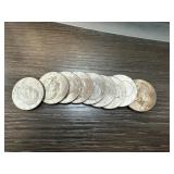 QTY 10 MIXED DATE IKE DOLLARS