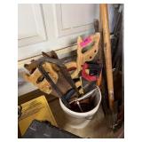 LARGE BUCKET OF SAWS / CROWBAR
