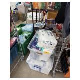SEVERAL BINS OF DISPOSABLE DIAPERS