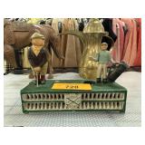 MECHANICAL CAST IRON COIN BANK BIRDIE PUTT