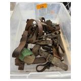 LARGE BIN OF LEATHER COW STRAPS