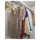 LOT OF CLOTHES THIS SIDE OF THE CLOSET