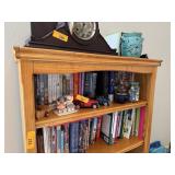 LOT OF NON BOOK ITEMS ON THE BOOKSHELF BELOW TOP