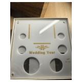 WEDDING YEAR CAPITAL HOLDER