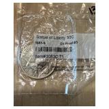 1986-S LIBERTY CLAD HALF DOLLAR