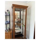 NICE LIGHTED CURIO CABINET W SLIDING FRONT