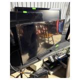 32IN SHARP FLAT SCREEN TV POWERS ON