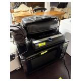 MIXED APPLIANCES VACUUM SEALER ON TOP OF MICROWAVE