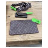 LOUIS VUITTON ZIPPERED BAG NOTE