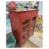 PRETTY GLASS FRONT RED CABINET