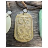 CHINESE CARVED JADE DRAGON PENDANT