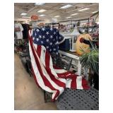 LARGE AMERICAN FLAG W A HOLE IN IT